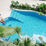 Woman relaxing by pool